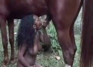 Ebony chick fucking a dog